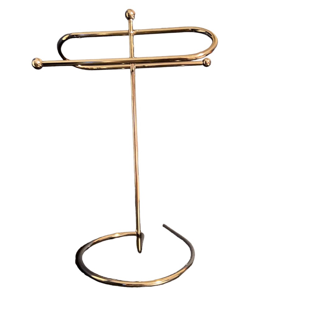 Silver colour free standing hand towel rack.